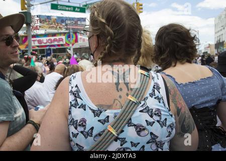 After 2 years from a Covid-19 shutdown, people return to the annual Mermaid Parade, alleged to be the largest art parade in the nation, at Coney Island along Surf Avenue in Brooklyn, New York. Stock Photo