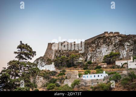 Aerial panoramic view over Chora, Kythira and the Castle in Kythira island, Greece at sunset. Stock Photo