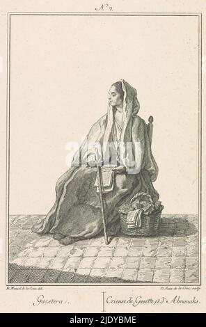 Saleswoman of newspapers and almanacs, Gazetera / Crieuse de gasette, et d'almanaks (title on object), Professions in Spain (series title), Coleccion de trajes de España (series title), In the street, a woman sits on a chair with a stick in her right hand and a stack of newspapers in her left. Next to her is a basket of almanacs and newspapers., print maker: Juan de la Cruz, (mentioned on object), after drawing by: Manuel de la Cruz, (mentioned on object), publisher: Miguel Copin, (mentioned on object), print maker: Spain, after drawing by: Spain, publisher: Madrid, 1777, paper, etching, heigh Stock Photo