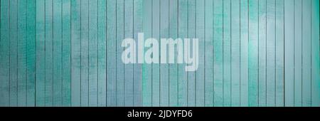 Light blue wood background - Aquamarine planks with peeling paint in vertical wood - Turquoise wooden surface Stock Photo