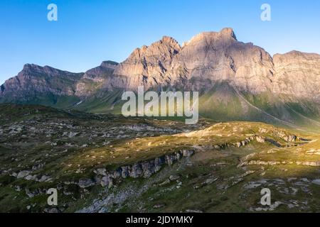 Aerial view of the Piz Uccello in San Bernardino pass at sunset. Graubünden, Moesa district, Switzerland, Europe. Stock Photo