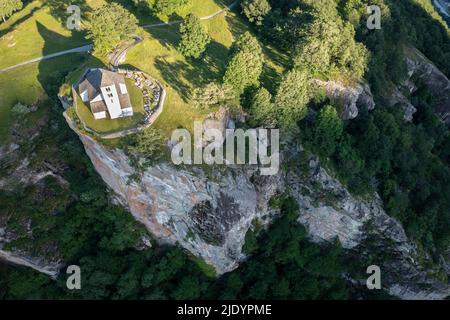 Aerial view of the church of Calonico. Calonico, district of Leventina, Canton of Ticino, Switzerland. Stock Photo