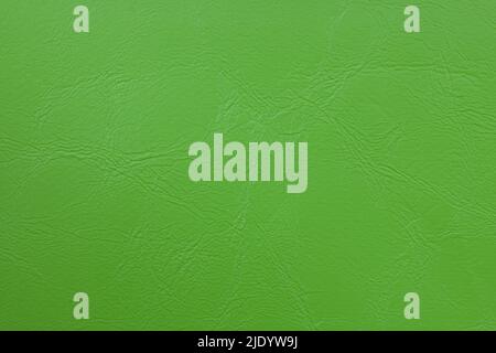 Background image - texture of light green leather with a textured pattern. Stock Photo