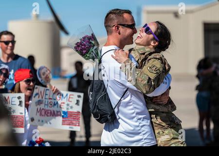 Tucson, Arizona, USA. 8th June, 2022. Family and friends greet redeploying members assigned to the 355th Wing and 563rd Rescue Group on the flight line at Davis-Monthan Air Force Base, Arizona, June 7, 2022. The members returned home to their families after a deployment overseas. Credit: U.S. Air Force/ZUMA Press Wire Service/ZUMAPRESS.com/Alamy Live News Stock Photo