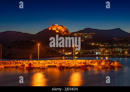 Beautiful view over Kapsali beach in Kythera island, Greece illuminated at night. Stock Photo