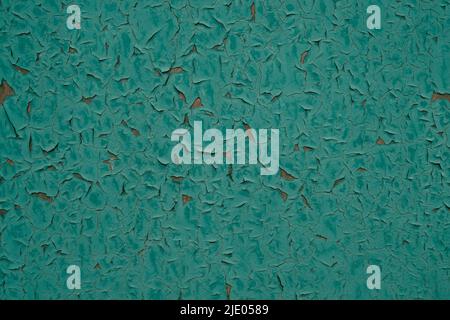 Abstract background peeling green paint on wall Stock Photo