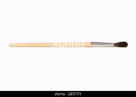 Paintbrush wooden handle isolated on white background Stock Photo