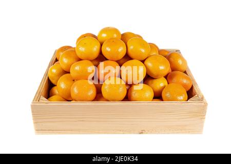 Wooden box with stack of tangerines on isolated white background. Stock Photo