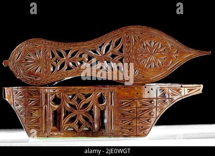 Still-life, antique shoes, clogs inlaid with fig wood, from Syria or Jordan, 1850-1890. Stock Photo