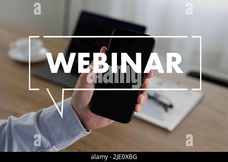 WEBINAR hand on table use E-business Browsing Connection in computer, coffee break in classroom to use cloud communication Stock Photo