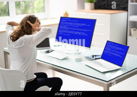Blue BSOD Error At Computer. Malware Attack Stock Photo