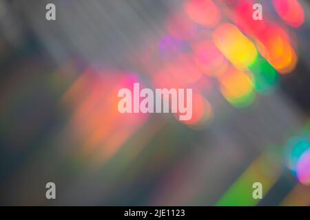 Rainbow holographic bokeh background. Multicolored overflows of color. Stock Photo