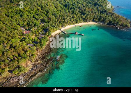 Aerial shot of Koh Kood island beach showing the bay with white sand and rocks Stock Photo