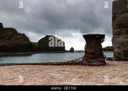 View of Mullion Cove Harbour, Cornwall on a June morning Stock Photo