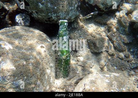 Bad underwater scenes with garbage in the Mediterranean sea Stock Photo