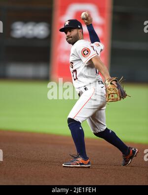 Houston Astros' Jose Altuve throws to first after forcing out Chicago ...