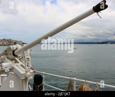 One of two white 37 mm BAZAN mountings used for gun salutes on the Elcano Spanish navy training ship Open day Santander Cantabria Spain Stock Photo