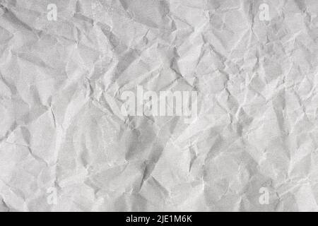 Creased paper background texture. Gray color. Full frame Stock Photo