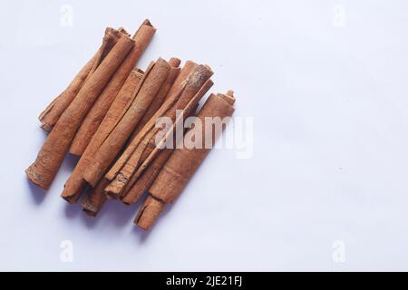 Cinnamon sticks on white background with copy space  Stock Photo