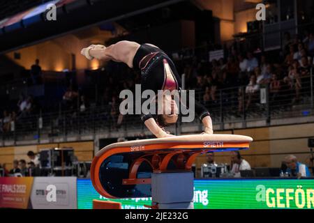Berlin, Germany. 24th June, 2022. Gymnastics: German championships, decision all-around, women. Sophie Scheder during her vault. Credit: Christophe Gateau/dpa/Alamy Live News Stock Photo