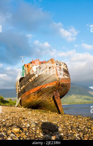 Old boat of Caol aka Corpach Shipwreck at Fort William, Highland, UK Stock Photo