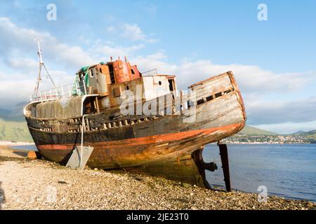 Old boat of Caol aka Corpach Shipwreck at Fort William, Highland, UK Stock Photo