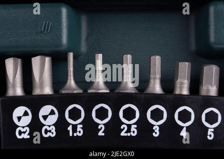 Macro detail of a set of allen screwdriver bits in their box Stock Photo