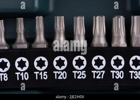 Macro detail of a set of torx screwdriver bits in their box Stock Photo