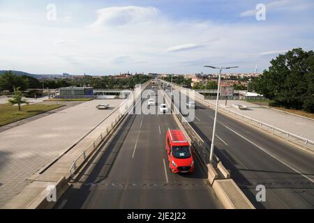 Nusle bridge, Prague, Czech Republic, Czechia - June 22, 2022: Cars and automobile are going on roadway in the center of capital  city. Traffic and tr Stock Photo