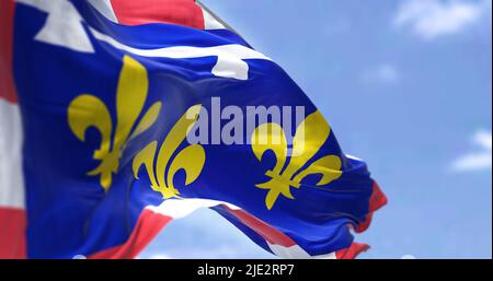 Rear view of the Centre Val de Loire flag waving in the wind on a clear day. Centre-Val de Loire is one of the eighteen administrative regions of Fran Stock Photo