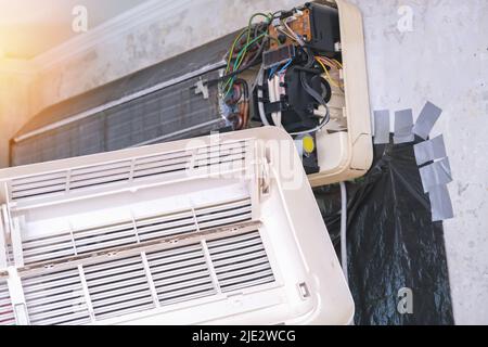 Mold and dust on the air conditioner body. Maintenance and cleaning of the split system. Stock Photo