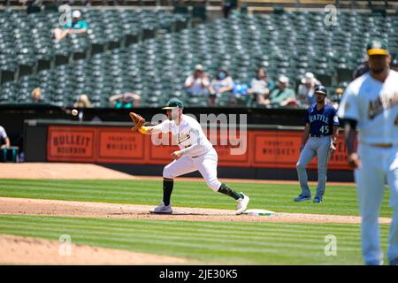 Oakland Athletics Infielder Seth Brown (15) catches the ball for an out during an MLB game between Seattle Mariners and Oakland Athletics at the RingC Stock Photo