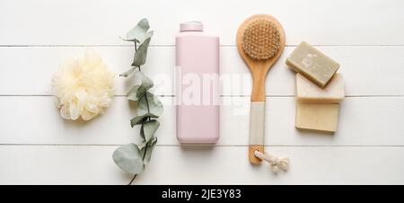 Composition with bath supplies on light wooden background with space for text, top view Stock Photo