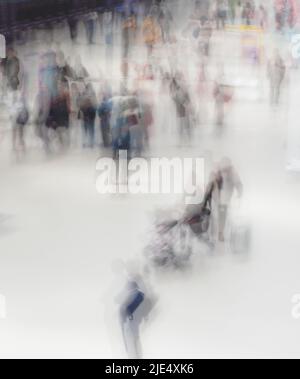 Semiabstract picture of a crowd of people blurred and unrecognisable Stock Photo