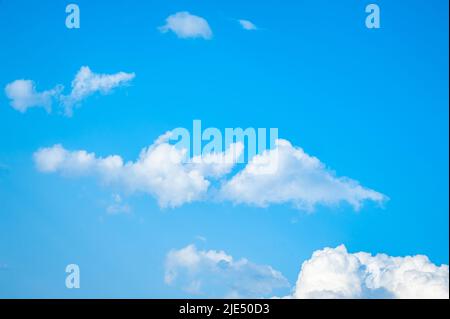 White heap clouds in the blue sky Stock Photo