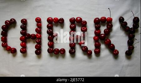 The word 'Cherry' spelled out in rosy red cherries Stock Photo