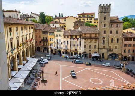 Aerial view of Piazza Grande from top of bell tower of Palazzo della Fraternita dei Laici in historic city centre of Arezzo in Tuscany, Italy Stock Photo