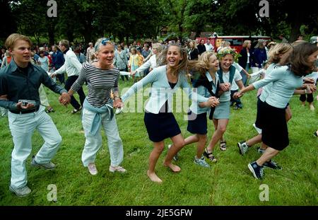 People during a midsummer celebration in Medevi brunn, Sweden. Stock Photo