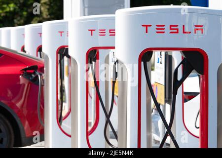 Tesla charging station UK Stock Photo