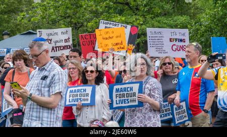 March for Our Lives Protest Rally in Boston, Massachusetts, US. Protesters holding anti-gun signs calling  for common sense gun legislation. Stock Photo