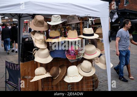 market stalls selling hats in the city of canterbury,kent,uk june 2022 Stock Photo