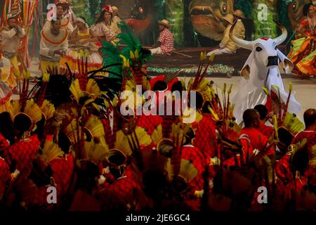 Parintins, Brazil. 25th June, 2022. AM - Parintins - 06/25/2022 - PARINRINS AMAZONAS, PARINTINS FOLK FESTIVAL 2022 - Presentation of the Boi-Bumba Garantido (red bull) during the first night of performances of the 55th Parintins Folk Festival 2022 this Friday (24) . Photo: Suamy Beydoun/AGIF Photo: Suamy Beydoun/AGIF/Sipa USA Credit: Sipa USA/Alamy Live News Stock Photo