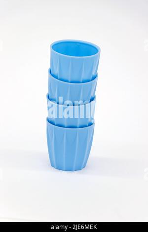 vintage blue plastic stacking egg cups Stock Photo