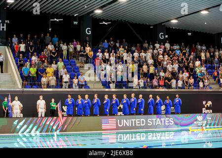 SZEGED, HUNGARY - JUNE 25: Adrian Weinberg of United States, Chase William Dodd of United States, Marko Vavic of United States, Thomas Gruwell of United States, Hannes Daube of United States, Jake Ehrhardt of United States, Ben Hallock of United States, Dylan Woodhead of United States, Alexander Bowen of United States, Benjamin Stevenson of United States, Matthew Farmer of United States, Maxwell Irving of United States and Drew Holland of United States during the FINA World Championships Budapest 2022 match between USA and Australia on June 25, 2022 in Szeged, Hungary (Photo by Albert ten Hove Stock Photo