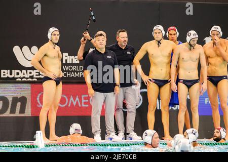 SZEGED, HUNGARY - JUNE 25: head coach Dejan Udovicic of United States, Adrian Weinberg of United States, Chase William Dodd of United States, Marko Vavic of United States, Thomas Gruwell of United States, Hannes Daube of United States, Jake Ehrhardt of United States, Ben Hallock of United States, Dylan Woodhead of United States, Alexander Bowen of United States, Benjamin Stevenson of United States, Matthew Farmer of United States, Maxwell Irving of United States and Drew Holland of United States during the FINA World Championships Budapest 2022 match between USA and Australia on June 25, 2022 Stock Photo