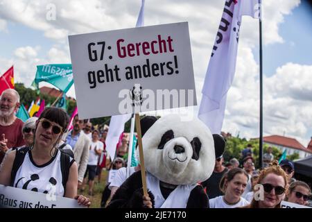 June 25, 2022, Munich, Bavaria, Germany: Demonstrators from the World Wildlife Fund for Nature in Munich, Germany. Seven years after the last Schloss Elmau G7 (Group of Seven) summit, the latest meeting is convening to discuss topics such as recovery from the Coronavirus crisis, fair and free trade, climate change, gender equality, and biodiversity. Like 2015, the 2022 installment was met by large protests in Garmisch, as well as in Munich, Germany. The total cost to German taxpayers for the summit is upwards of 170 million Euros with around 140 million for police alone. (Credit Image: © Sac Stock Photo