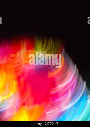 Art blurred bokeh sparks flying background with motion effect. Many abstract flowing light trails effect. Stock Photo