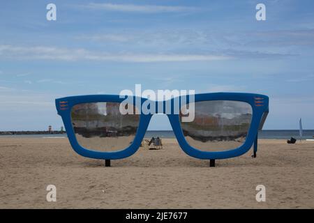 A pair of giant sunglasses on the beach, Hague Beach - Scheveningen beach -  the Netherlands Stock Photo - Alamy