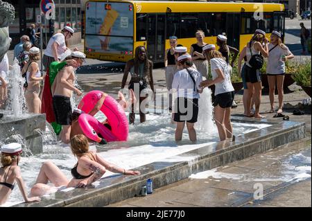 Students in a a fountain celebrating graduating from high school in Aarhus, Denmark on 25 June 2022 Stock Photo