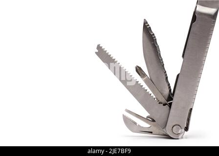 Close-up of a handle of a professional large multi-tool folding knife with a serrated edge Knife Phillips screwdriver Saw and can opener on a white ba Stock Photo